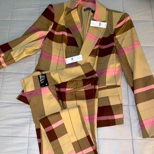 Brand new. Blazer size 8; pants size 4.